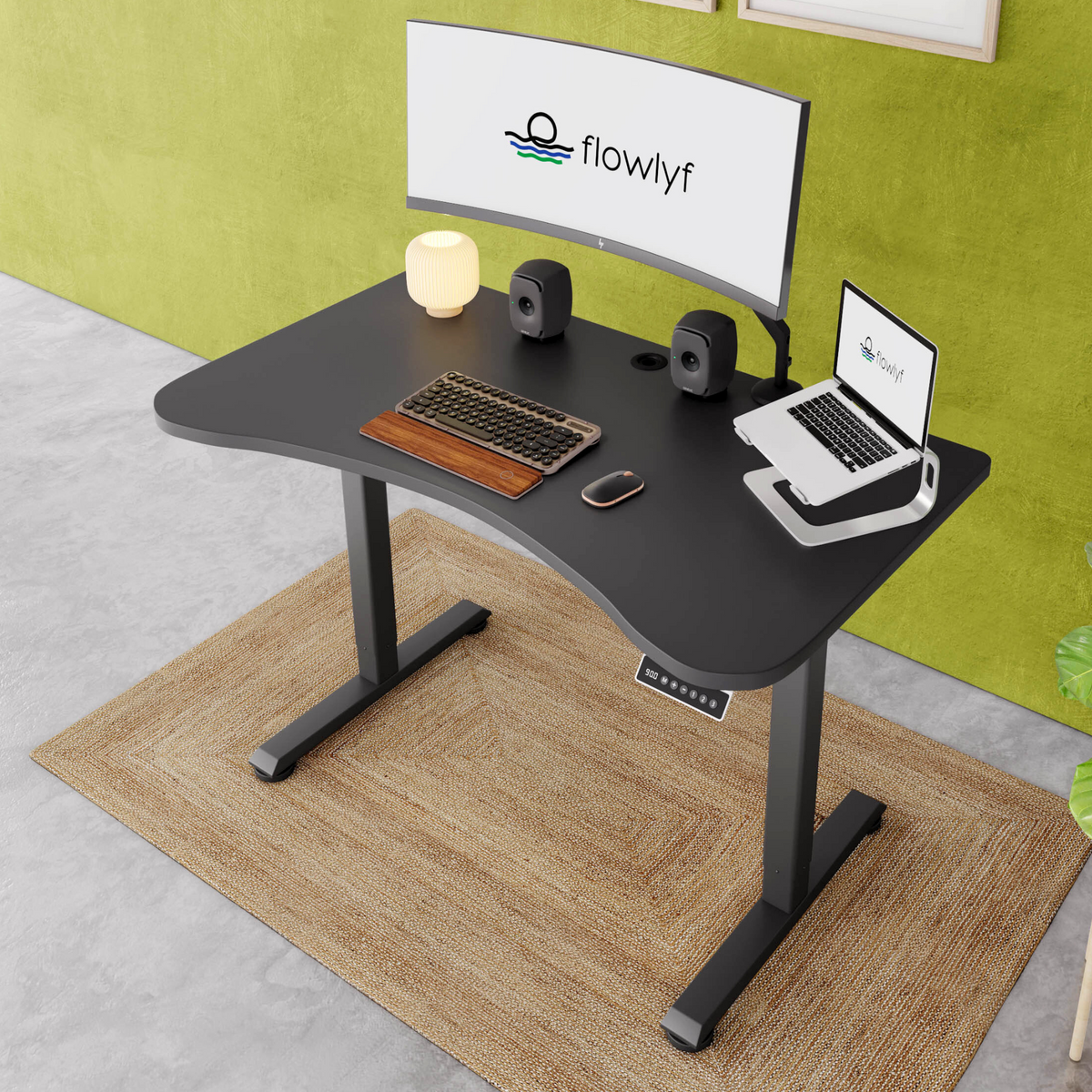 FlowDesk GO 2-stage single motor standing desk with black engineered wood table top and grey finish frame with stable ergonomic design