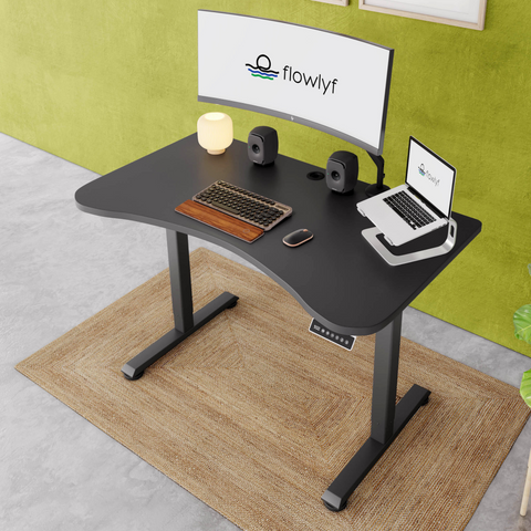 FlowDesk GO 2-stage single motor standing desk with black engineered wood table top and grey finish frame with stable ergonomic design