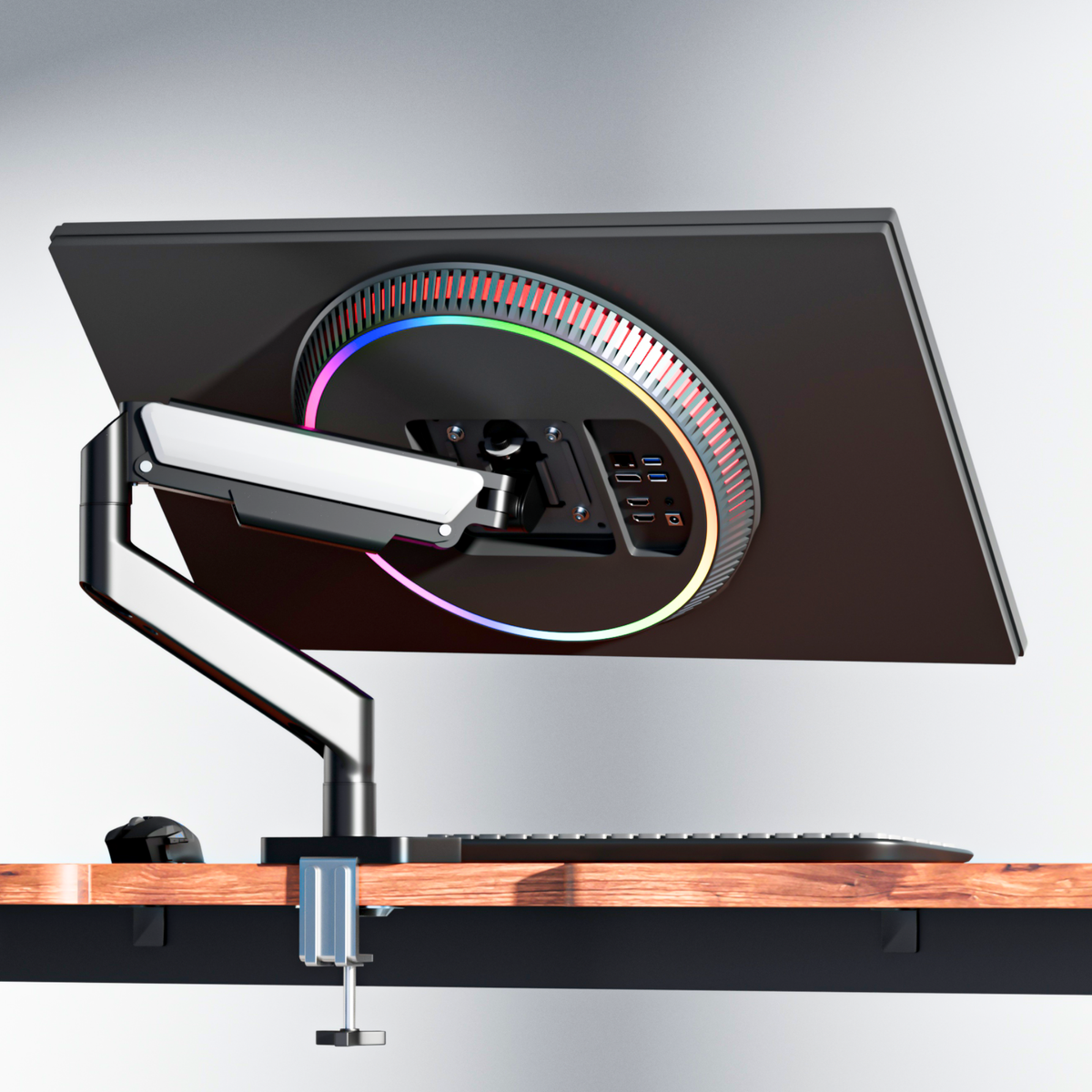 FlowArm Monochrome matte black gas spring monitor arm on minimal white desk setup India