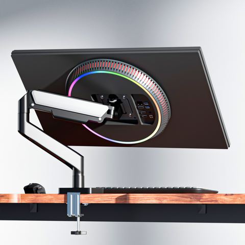 FlowArm Monochrome matte black gas spring monitor arm on minimal white desk setup India