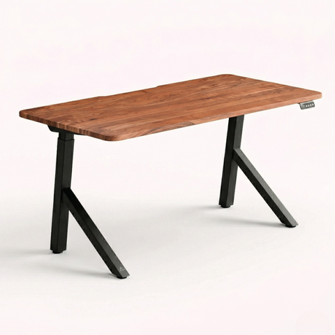 FlowDesk Aero black frame angled view showing sculptural Y-shape leg geometry and digital sit-to-stand controller